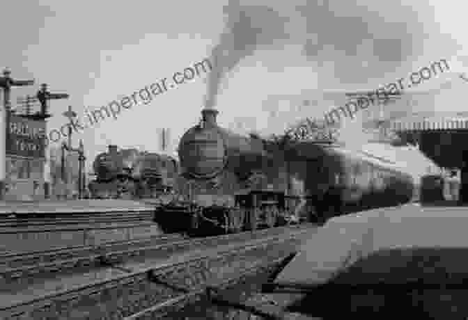 A Black And White Photograph Of A Steam Train Pulling Into A Station In The 1950s London Local Trains In The 1950s And 1960s