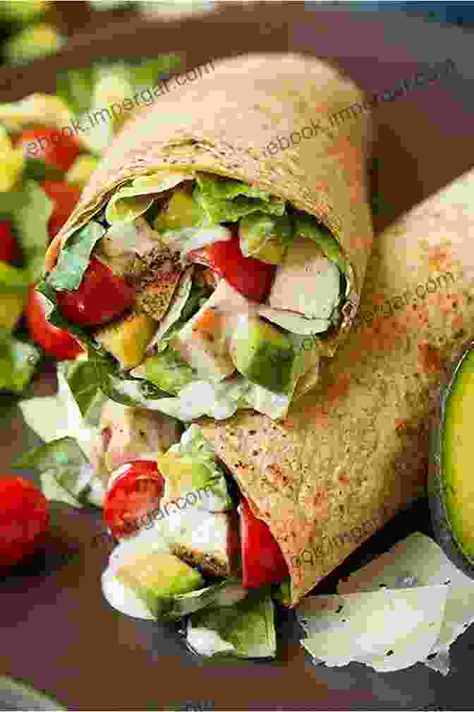 A Colorful And Appetizing Salad And Wrap, Featuring Fresh Vegetables, Grilled Chicken, And A Creamy Avocado Spread. Healthy Ideas For Lunch