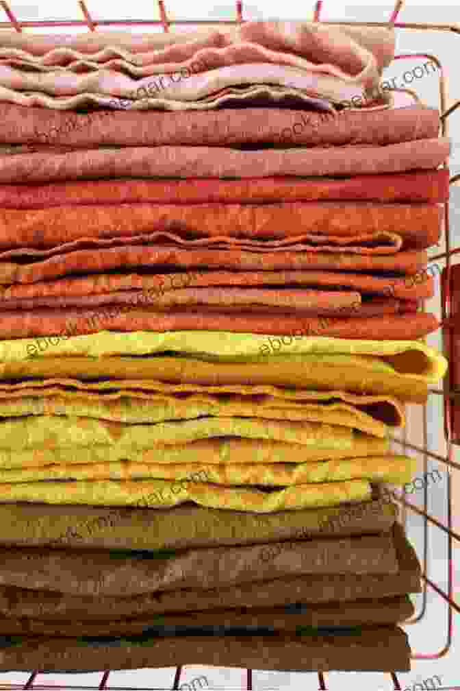 A Piece Of Ancient Fabric Displaying Vibrant Colors Achieved Through Natural Dyeing Techniques First Textiles: The Beginnings Of Textile Production In Europe And The Mediterranean: The Beginnings Of Textile Manufacture In Europe And The Mediterranean (Ancient Textiles 32)