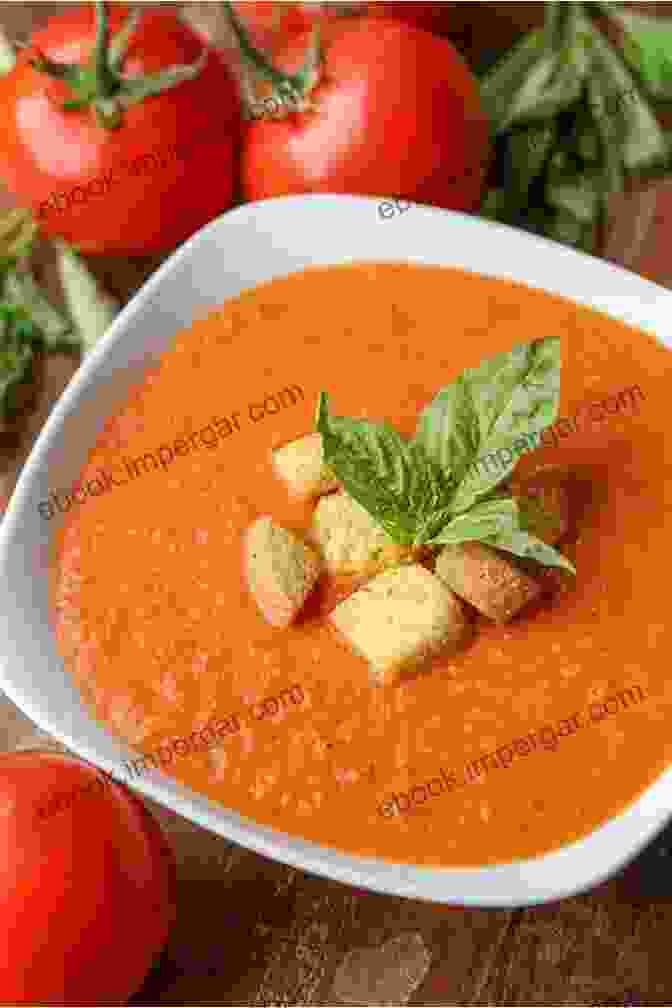 A Steaming Bowl Of Creamy Tomato Soup With Fresh Basil 365 Daily Soup Recipes: I Love Soup Cookbook